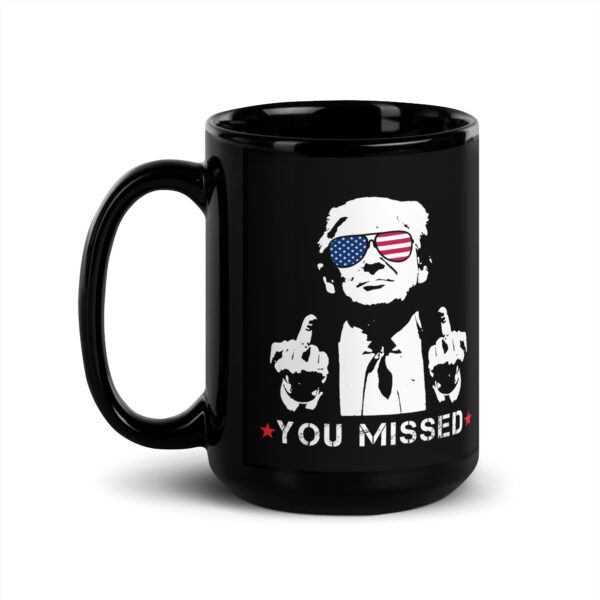 Trump Coffee Mug showing Trump flipping both middle fingers.